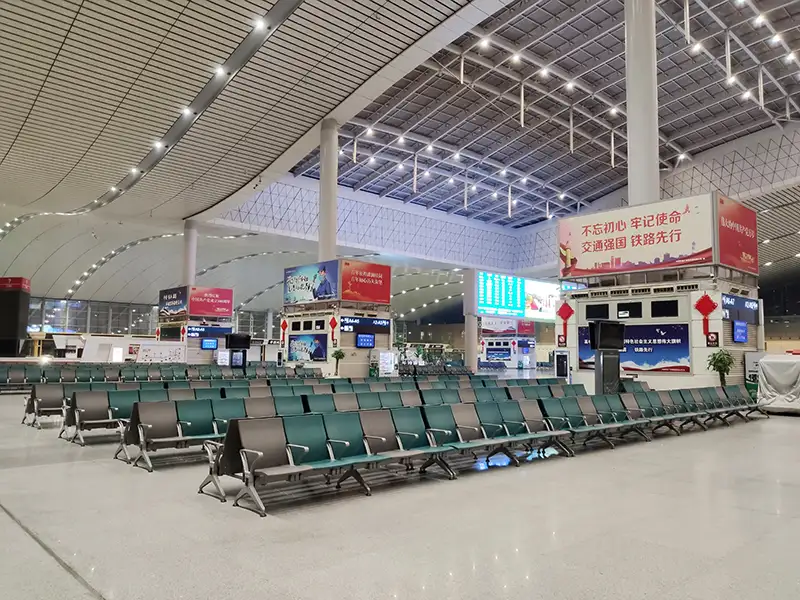 FLYA public seating at changsha airport transit lounge with comfortable lounge chairs and resting beds for layover passengers