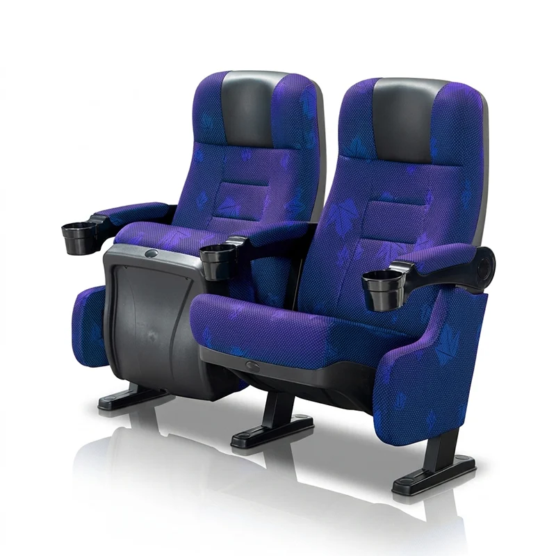 Built-in wireless charging pad integrated into VIP cinema seat armrest for convenient device charging