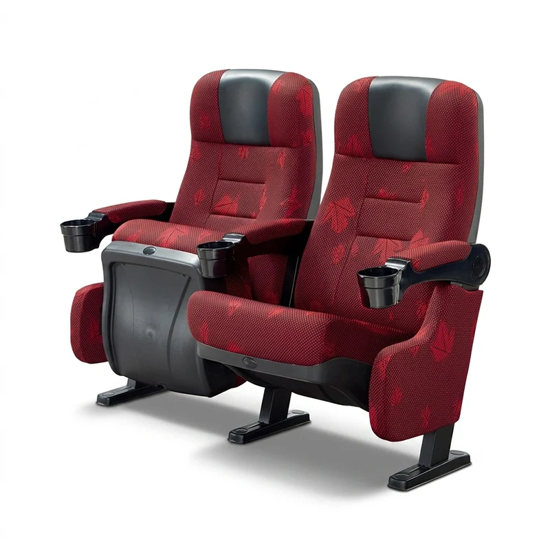 VIP cinema seat equipped with dual USB charging ports for personal electronic devices during movie screening