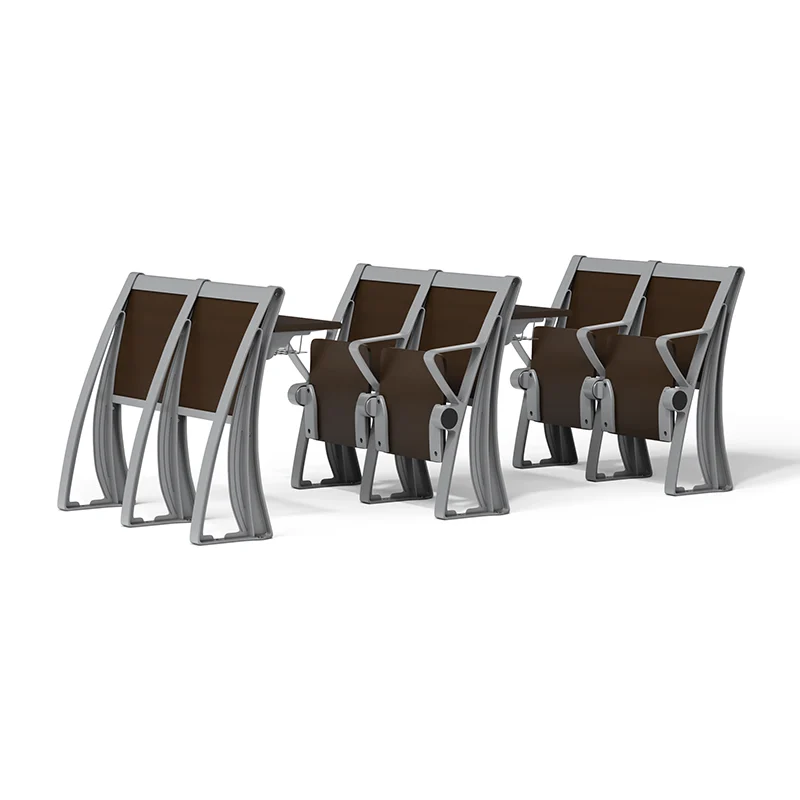FLYA auditorium chairs in presentation hall with projection screen and stage lighting.