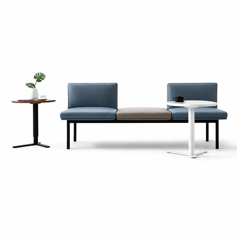 Three-seater fabric waiting bench without armrests and tufted backrest, elegant corporate reception seating for office lobbies and executive areas.