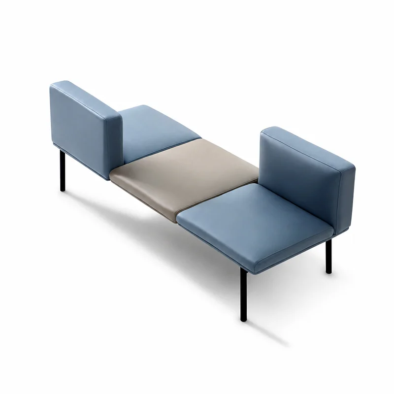 Three-seater fabric waiting bench without armrests and tufted backrest, elegant corporate reception seating for office lobbies and executive areas.