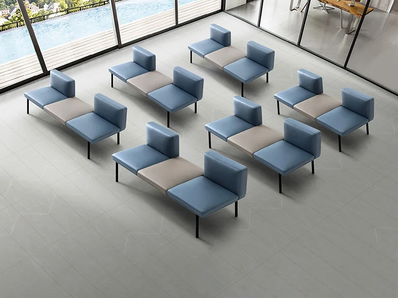 Three-seater fabric waiting bench without armrests and tufted backrest, elegant corporate reception seating for office lobbies and executive areas.