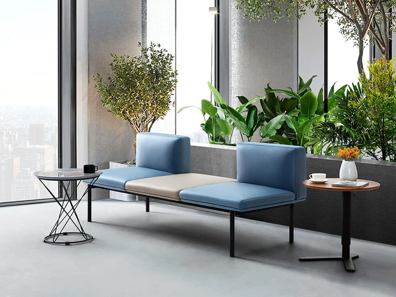 Three-seater fabric waiting bench without armrests and tufted backrest, elegant corporate reception seating for office lobbies and executive areas.