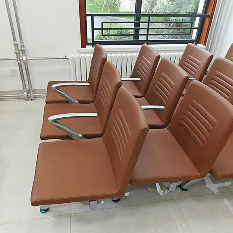 3-seater PU leather bench with powder-coated steel frame and armrests, heavy-duty public seating for train stations and bus terminal waiting areas.