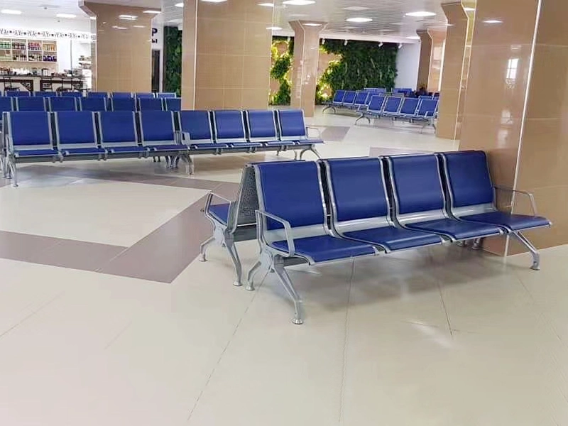 Ergonomic curved backrest airport chair supporting natural spine posture for waiting.