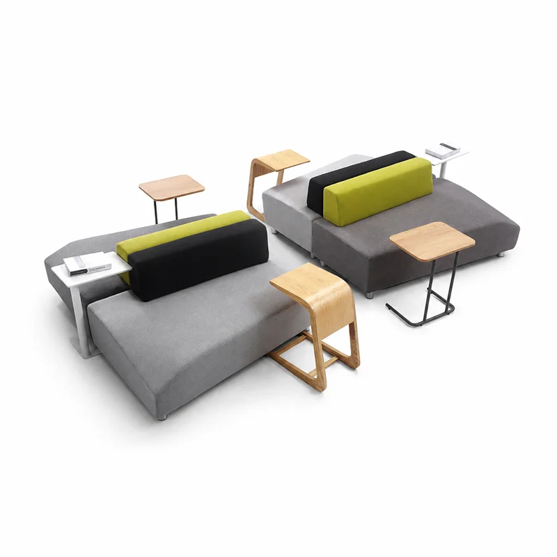 fabric modular puzzle seating for conference lounge with reconfigurable pieces for team discussions and workshops