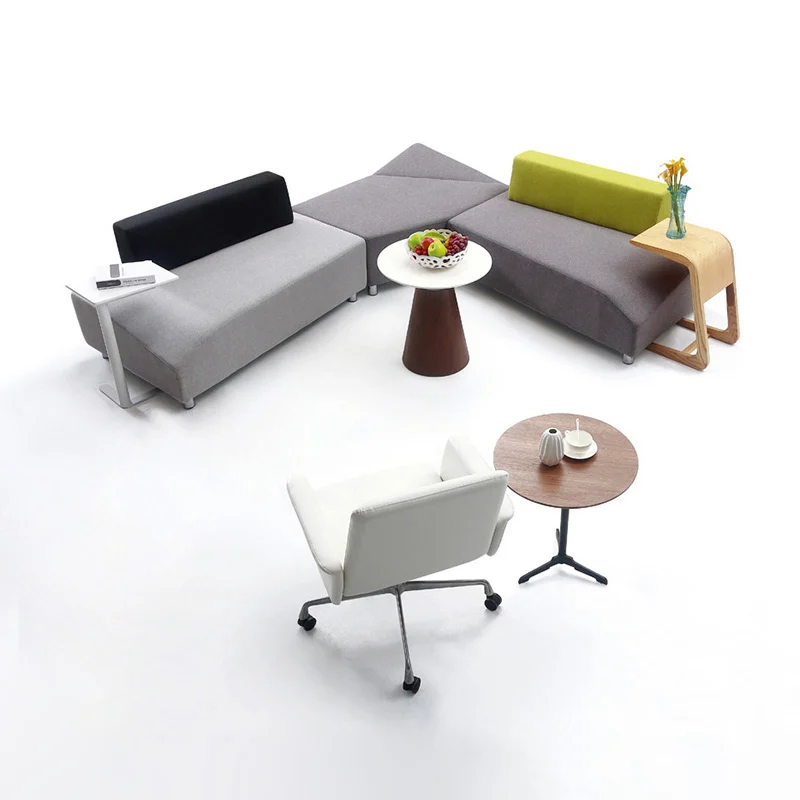 fabric modular puzzle seating for conference lounge with reconfigurable pieces for team discussions and workshops