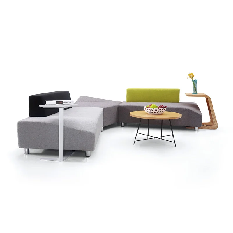 fabric modular puzzle seating for conference lounge with reconfigurable pieces for team discussions and workshops