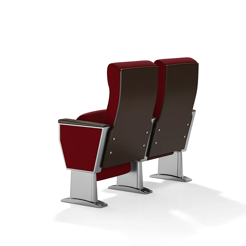 Conference center auditorium chair with tablet arm for note taking during meeting.