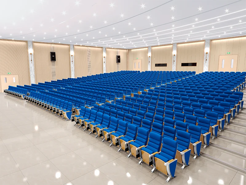 Wide armrest auditorium chair with shared armrest between two seats.