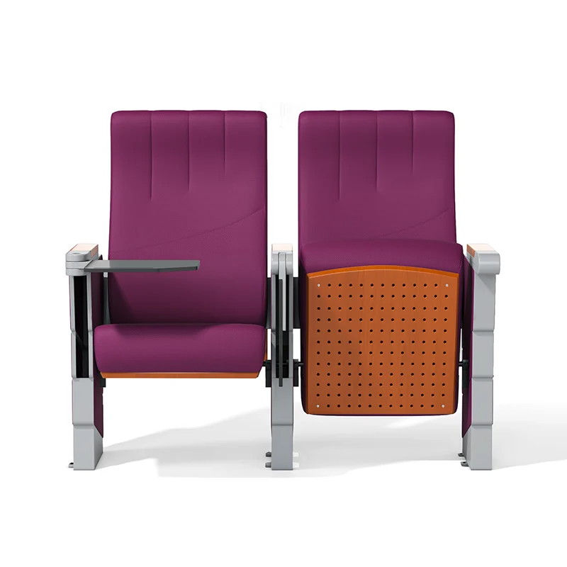 Auto tipping up auditorium chair for easy cleaning between cinema showtimes.