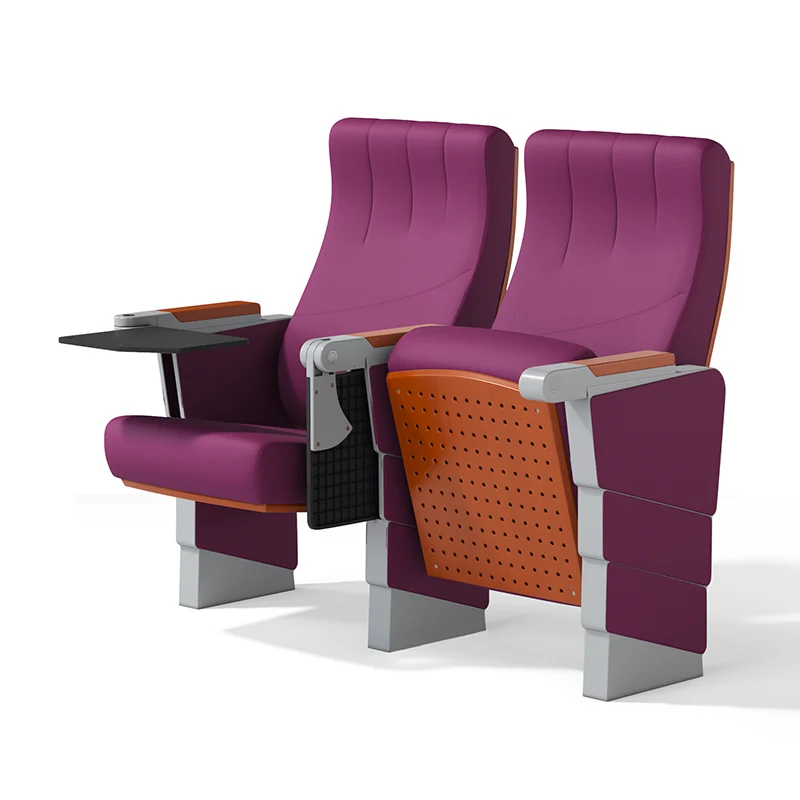 Auto tipping up auditorium chair for easy cleaning between cinema showtimes.