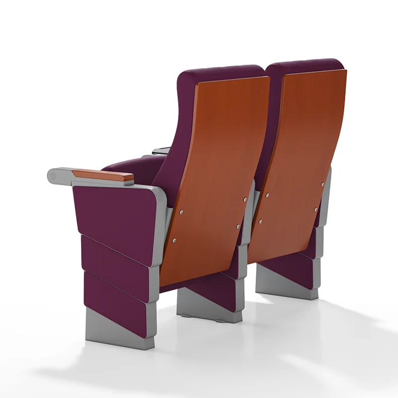 Auto tipping up auditorium chair for easy cleaning between cinema showtimes.