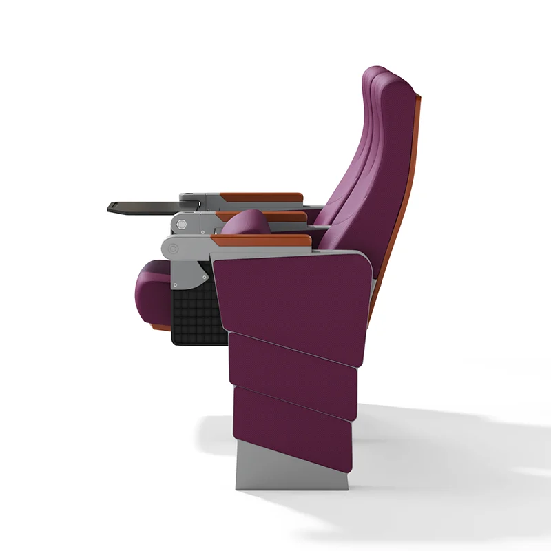 Auto tipping up auditorium chair for easy cleaning between cinema showtimes.