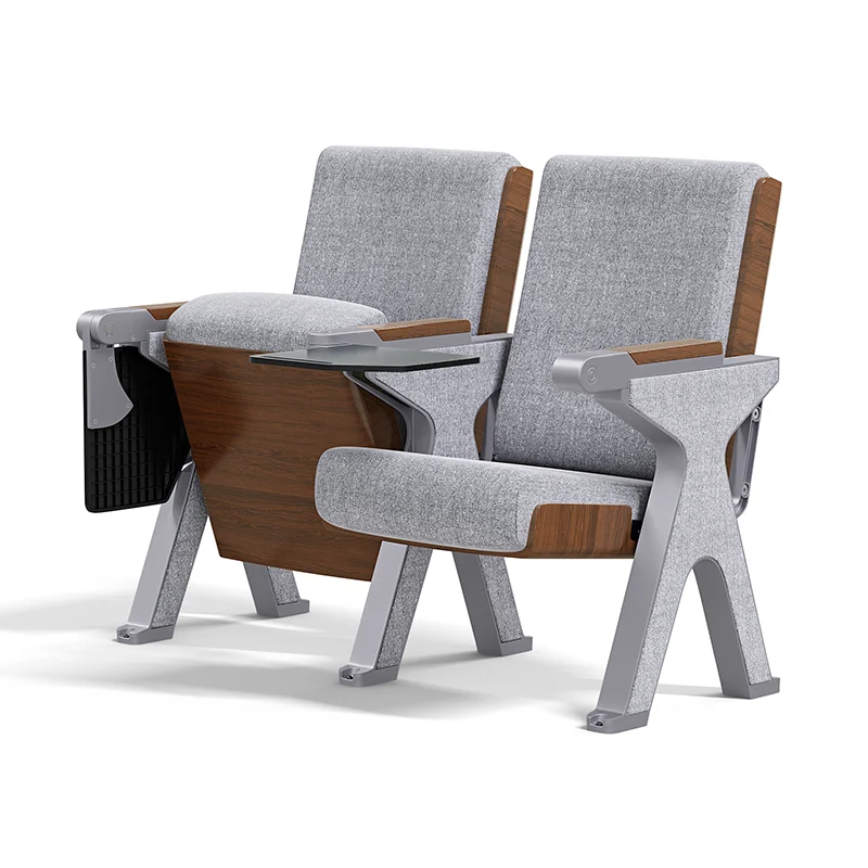 Auditorium chair with wider aisle arm for end of row installation.