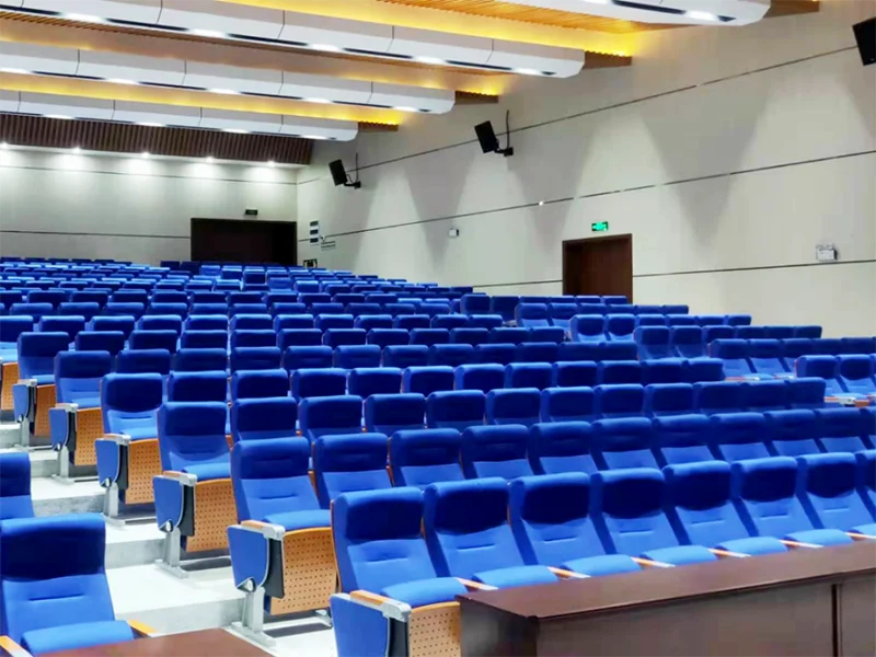 Easy clean vinyl auditorium chair for cinema with food and drink service.