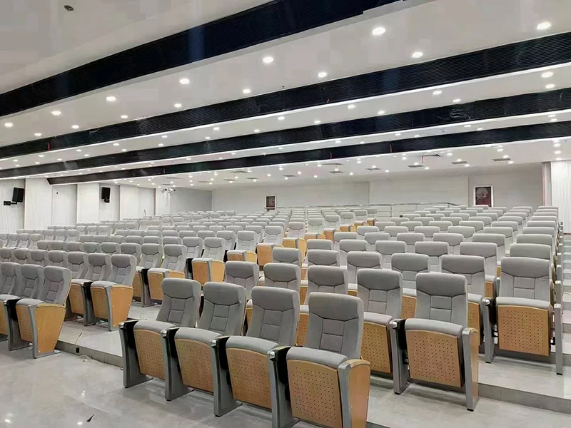 Auditorium chair with folding system for space saving in multi purpose hall and school.
