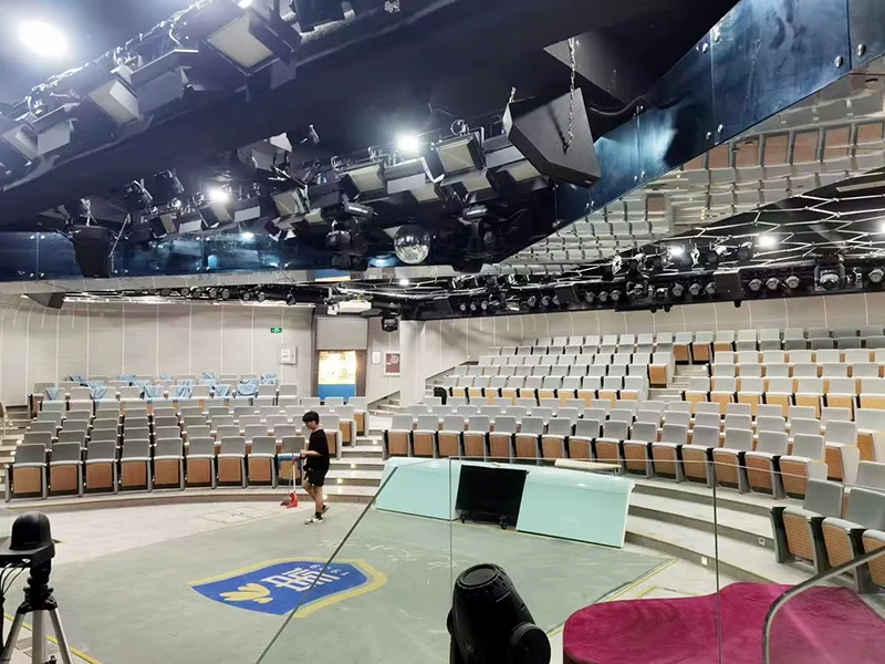 Auditorium chair with folding system for space saving in multi purpose hall and school.