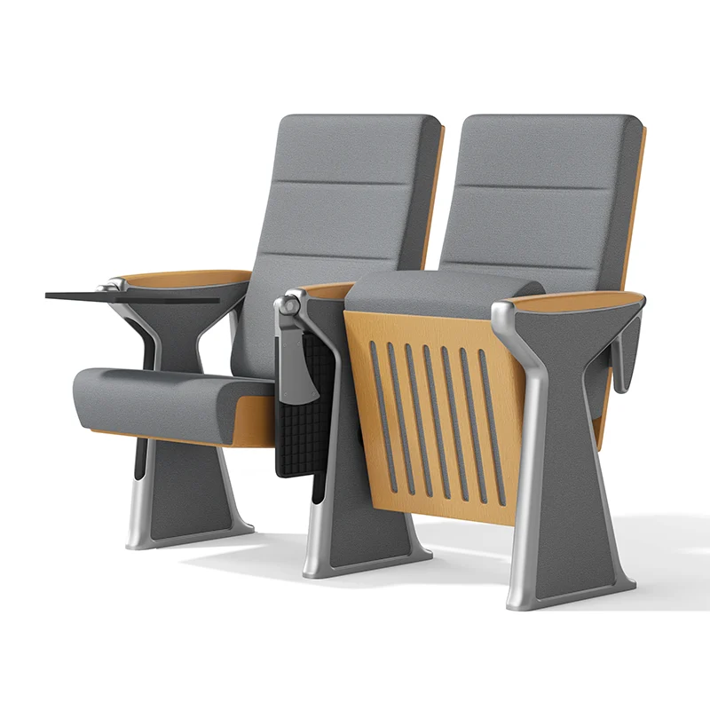 Complete auditorium seating chair with gravity lift for maintenance access.