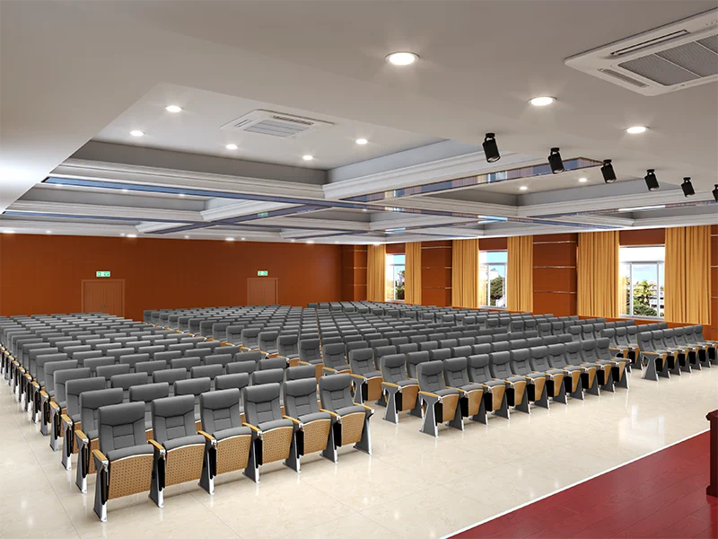 Complete auditorium seating chair with gravity lift for maintenance access.