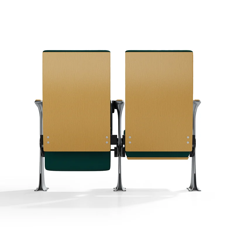 Complete auditorium seating chair with gravity lift for maintenance access.