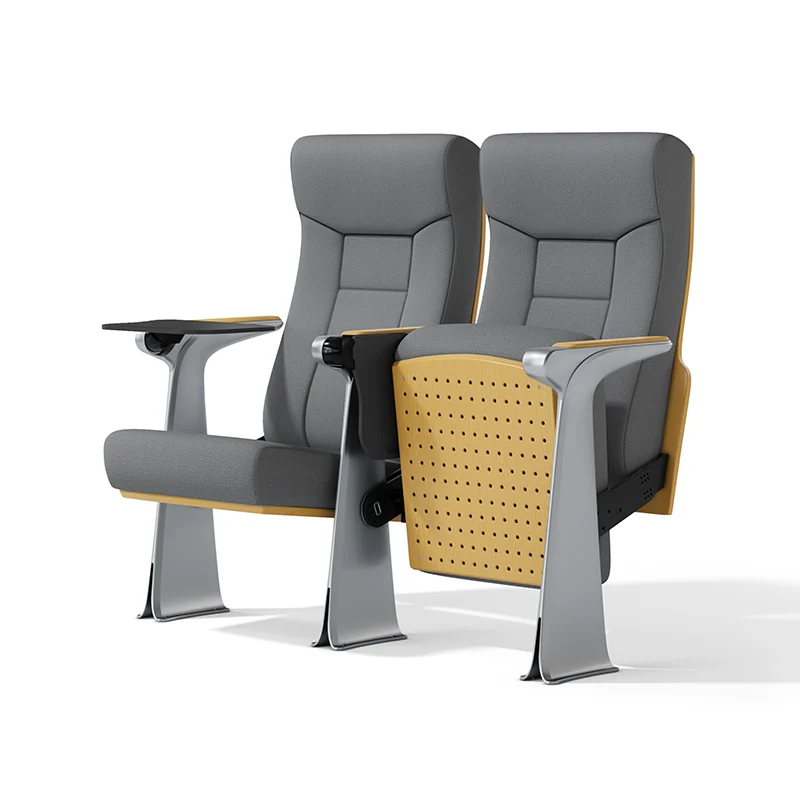 Complete auditorium seating chair with gravity lift for maintenance access.