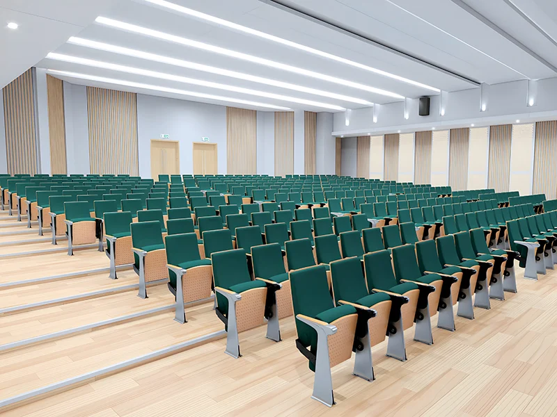 Complete auditorium seating chair with gravity lift for maintenance access.