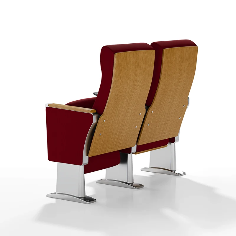 Complete auditorium seating chair with gravity lift for maintenance access.