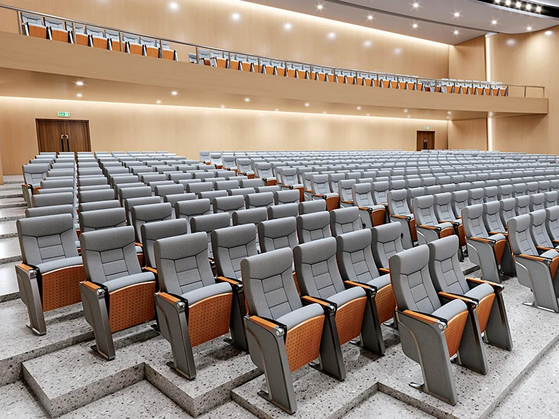 Auditorium chair with foldable writing tablet for lecture hall and exam room use.