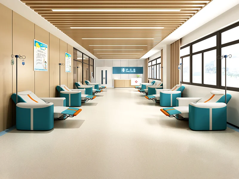 hospital-waiting-area-one-seat-chairs-row hospital waiting area furnished with multiple two seat chairs arranged for social distancing.