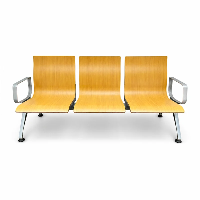 Airport waiting chairs with integrated backrests and seats made from solid wood multilayer panels.